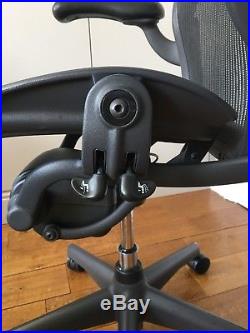 http://hermanmilleraerongroup.com/wp-content/pictures/Aeron_Office_Chair_Herman_Miller_Size_B_With_Forward_Tilt_Used_05_fed.jpg