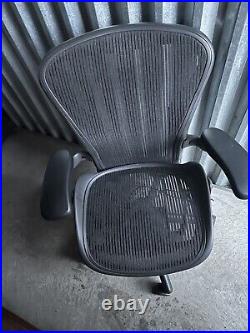 Aeron Adjustable swirling office chair by Herman Miller