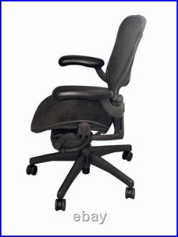 Herman Miller Aeron Black Office Chair With Pellicle Mesh And Fixed Vinyl Arms