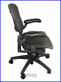 Herman Miller Aeron Black Office Chair With Pellicle Mesh And Fixed Vinyl Arms