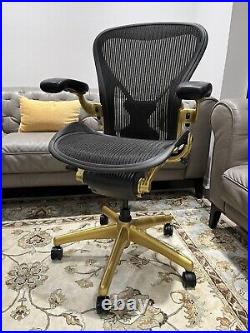 Herman Miller Aeron Classic Chair medium size B in Gold trim with Posture-Fit